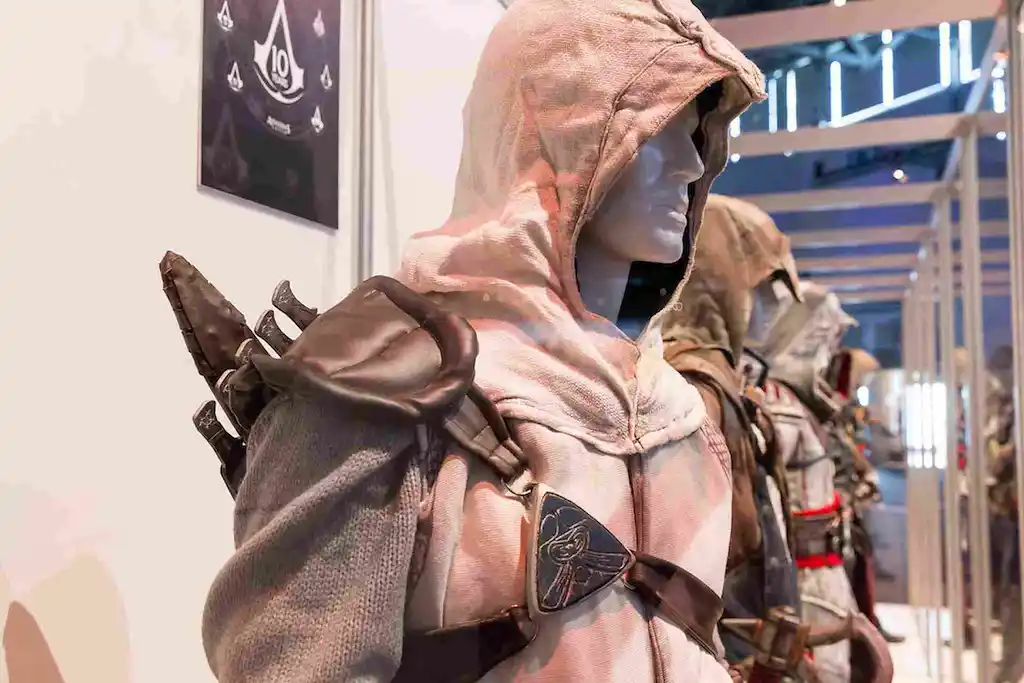 An Ezio costume display from Assassin's Creed